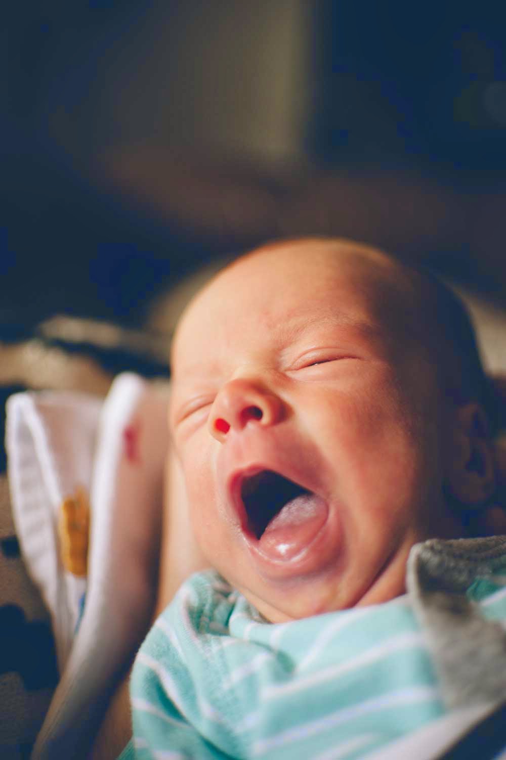 Sometimes, this is how Sam feels about being a baby. (Usually, though, he's much more chill than this.) 